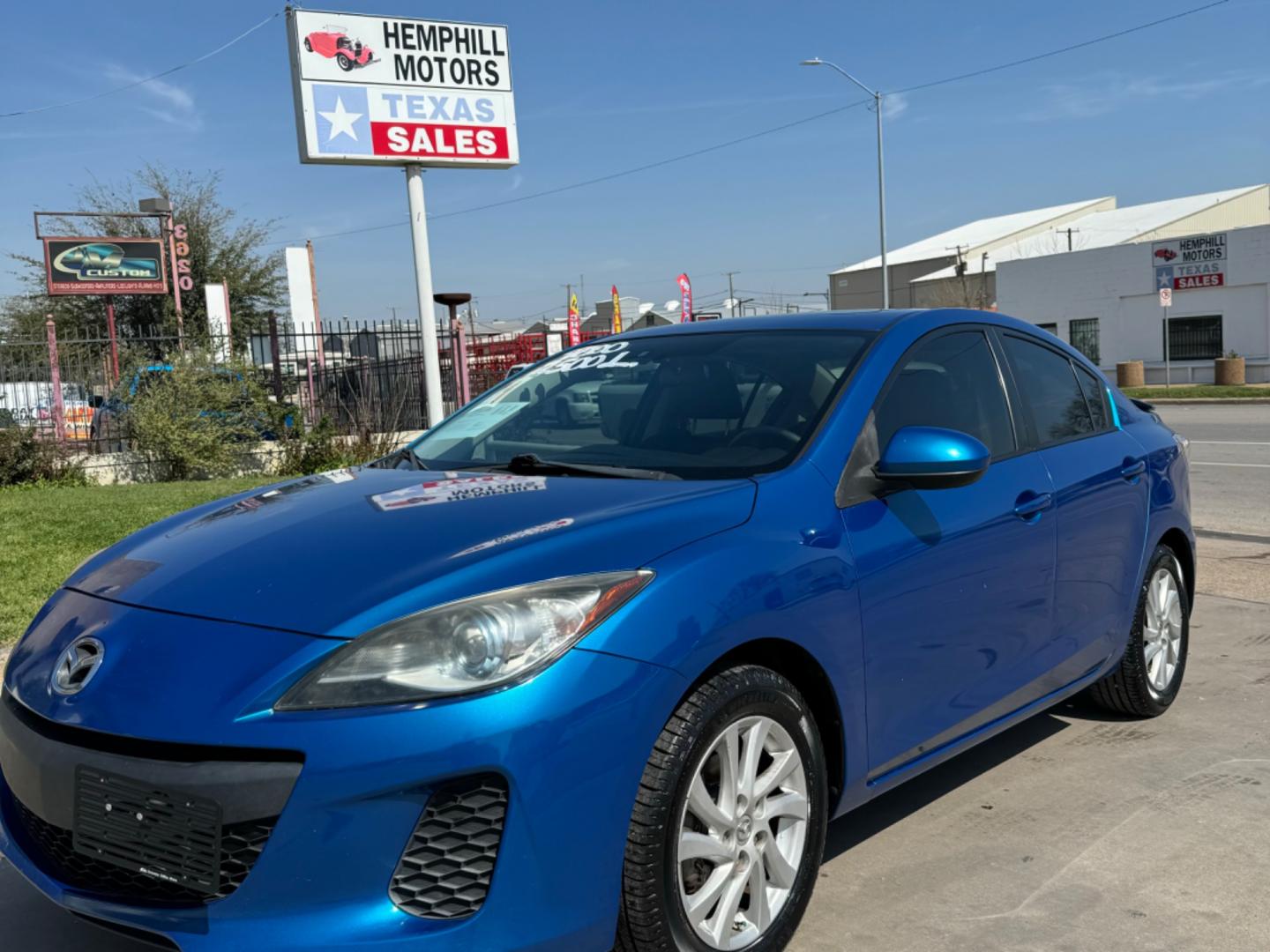 2012 Blue Mazda MAZDA3 I Grand Touring 4-Door (JM1BL1W7XC1) with an 2.0L L4 DOHC 16V engine, Automatic transmission, located at 3624 Hemphill St., Fort Worth, TX, 76110, (817) 926-8921, 32.696205, -97.331985 - Photo#0